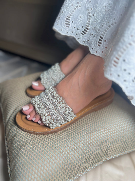 Pearl Wave Embellished Comfort Flats Sandal Stories