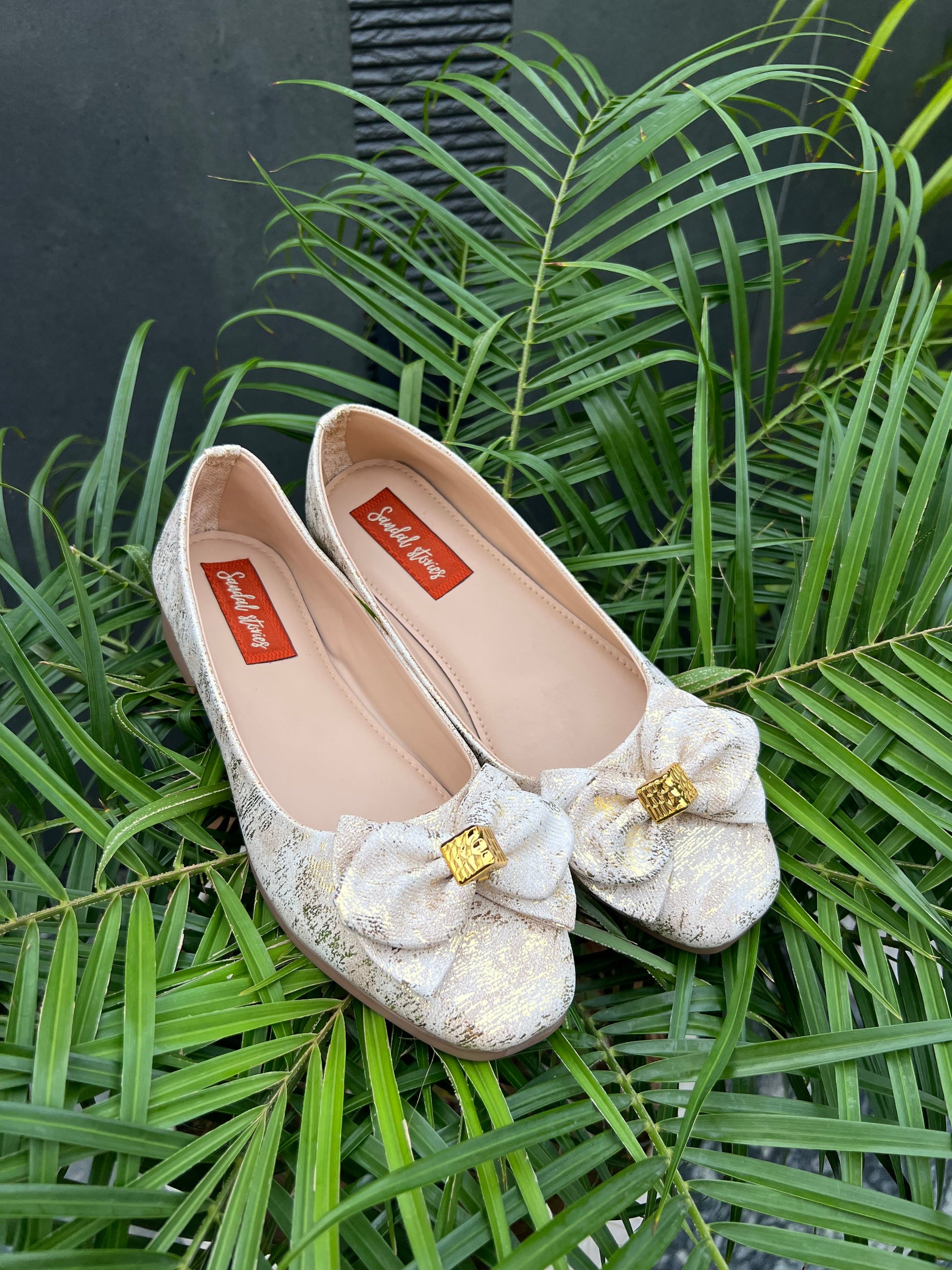 Golden Bloom Bow Ballerinas Sandal Stories
